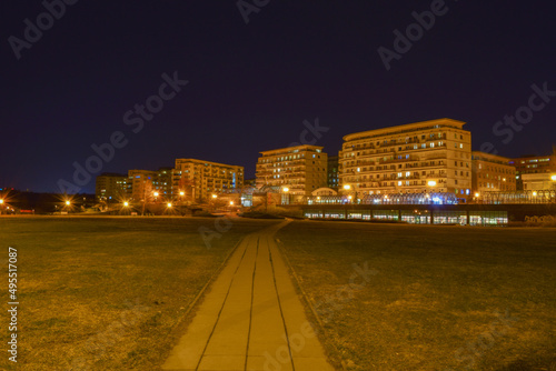 Road to the subway  illuminated houses  night city landscape