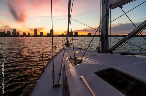 View of city skyline at sunset from yacht