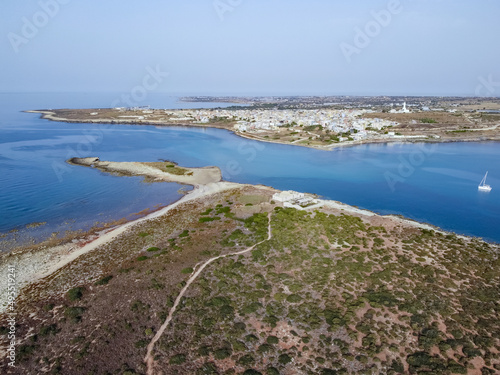 Aerial drone. Rocky coastline and island at Portopalo di Capo Passero, Siracusa Province, Sicily. © Roberto