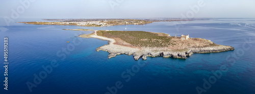 Aerial drone. Rocky coastline and island at Portopalo di Capo Passero, Siracusa Province, Sicily. photo