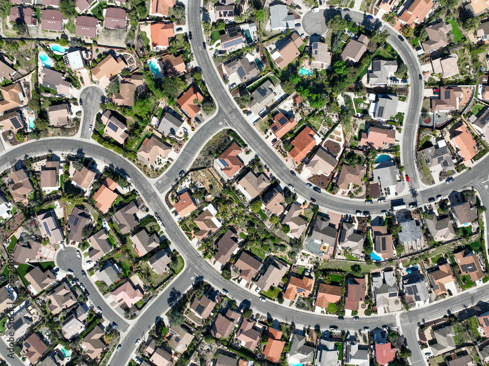 Aerial top view of middle class neighborhood with villas in South California, USA
