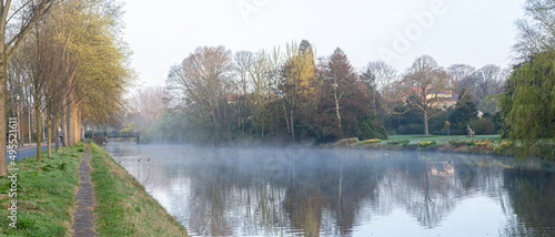 Low hanging fog over a river © Menyhert