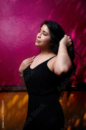 Sensual young latin woman posing in mexican town