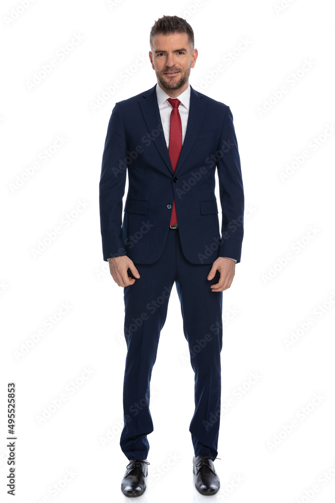 fashion model wearing a nice suit with red tie fashion model wearing a nice suit with red tie