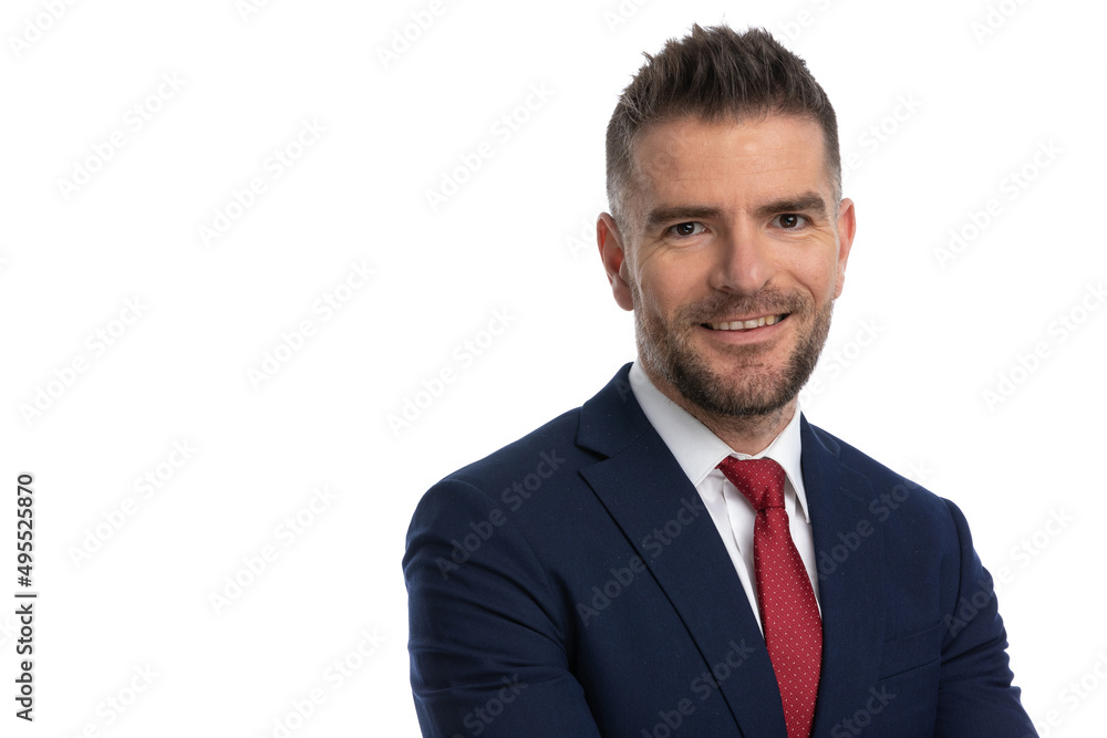 young businessman giving a big smile at the camera young businessman giving a big smile at the camera