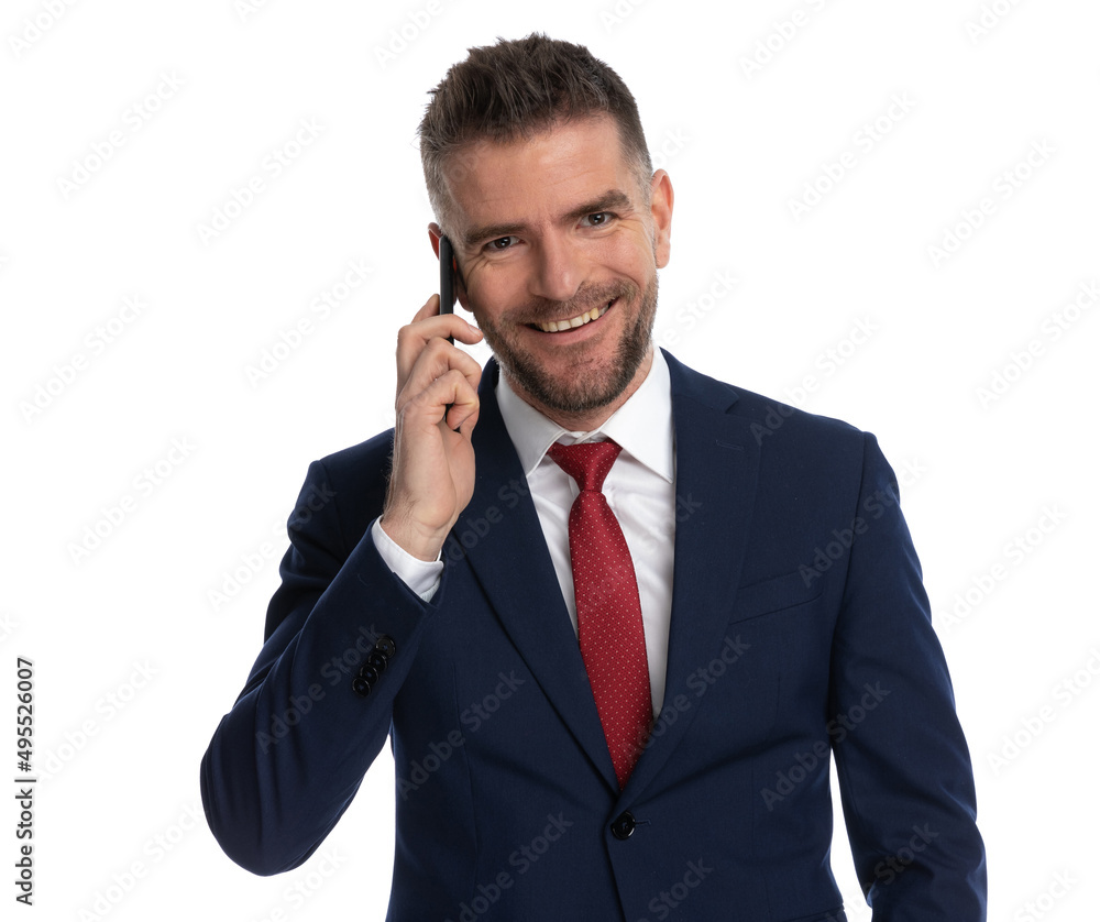 businessman having a good time talking on the phone businessman having a good time talking on the phone
