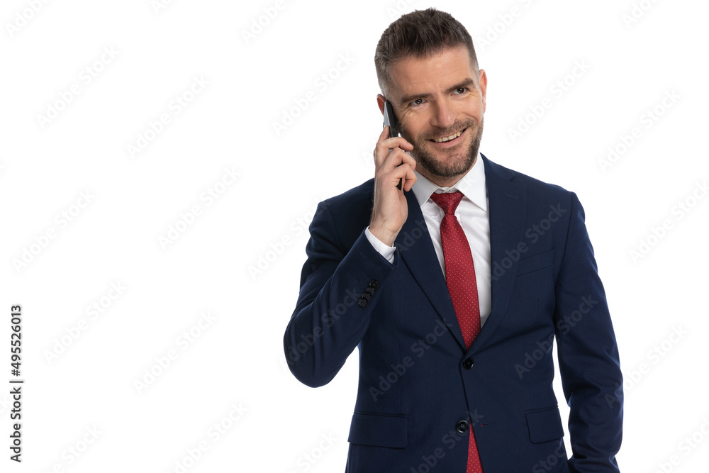 businessman having a nice conversation on the phone businessman having a nice conversation on the phone