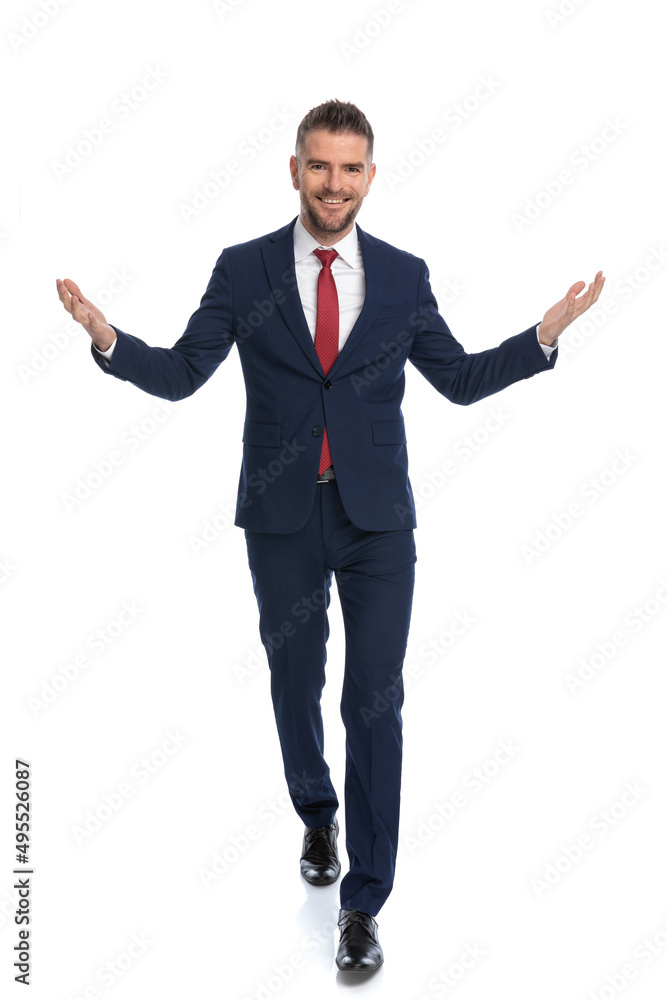 businessman greeting us with open arms and a wide smile businessman greeting us with open arms and a wide smile