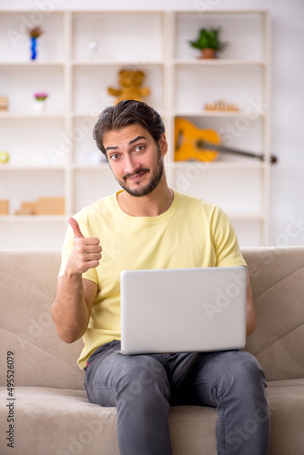 Young male student studying at home © Elnur