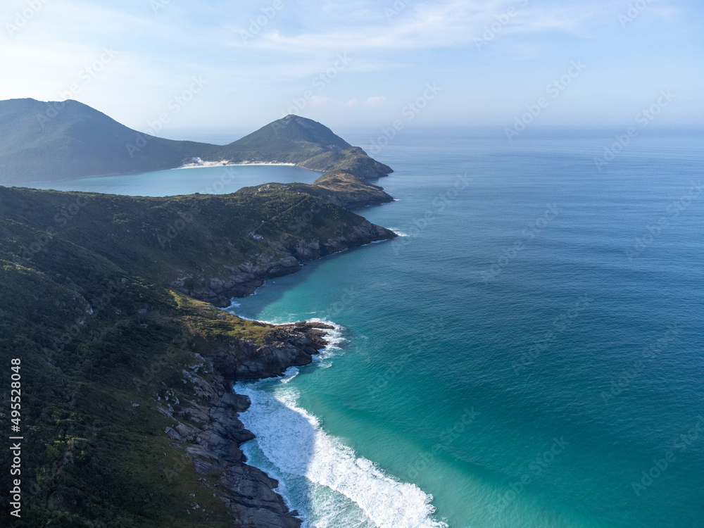 Fototapeta premium Arraial do Cabo, Rio de Janeiro, Brazil - red sunrise of wonderful paradise beach with white sands and turquoise water