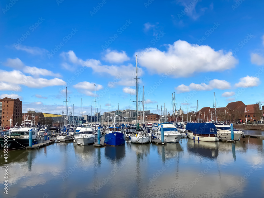  View across marina with sails boats moored.