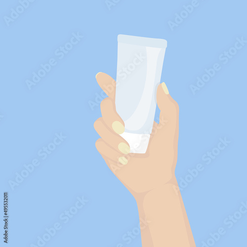 Female hand holding a cream tube vector flat illustration