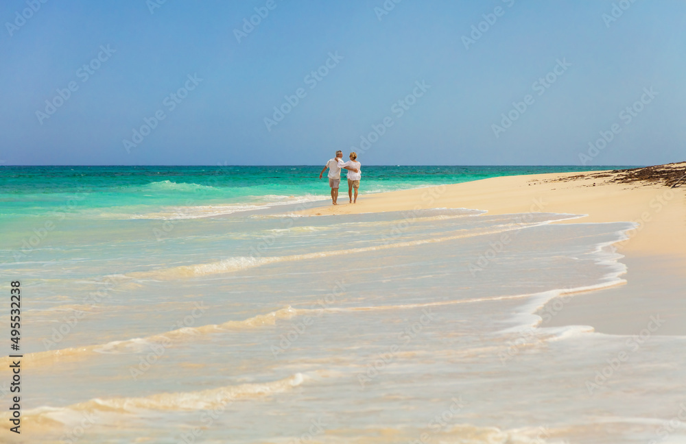 Affectionate senior Caucasian couple on tropical island Bahamas