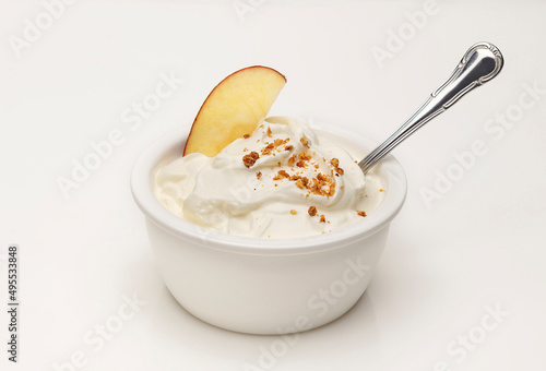 yogurt served with apple and nuts