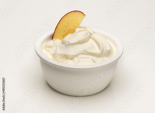 yogurt and an apple slice