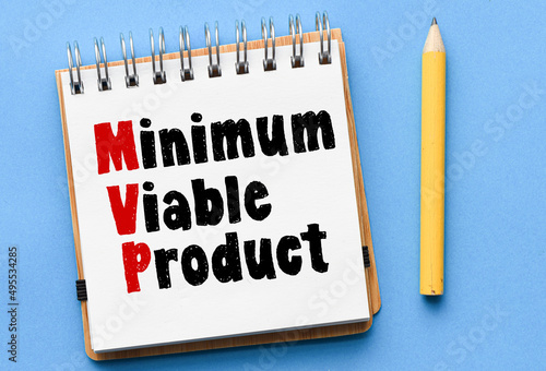 MVP, minimum viable product symbol. Words written in the office notebook. photo