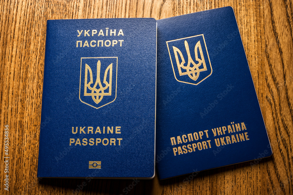 Ukraine passport on wood table Ukraine passport on wood table