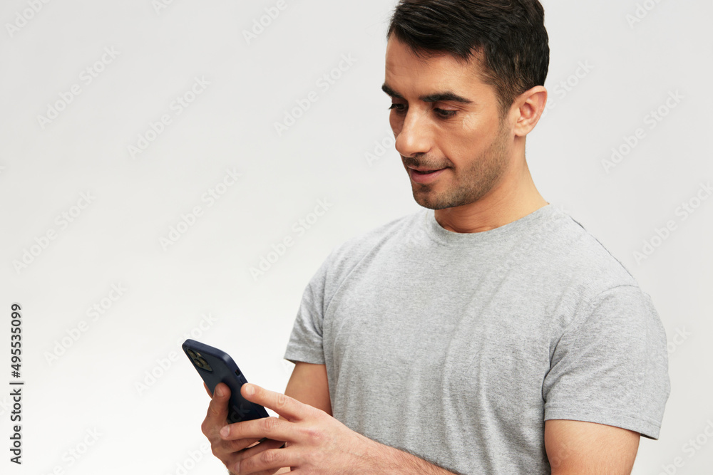 handsome man phone conversation lifestyle smile isolated background handsome man phone conversation lifestyle smile isolated background