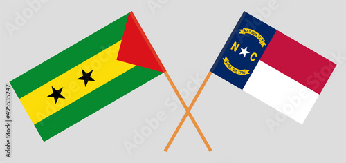 Crossed flags of Sao Tome and Principe and The State of North Carolina. Official colors. Correct proportion