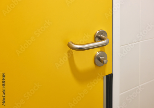 door handle in a public restroom