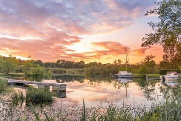 Wandcirkels Olijfgroen Kustlijn van Biscarrosse bij zonsondergang  © Vini Photographie