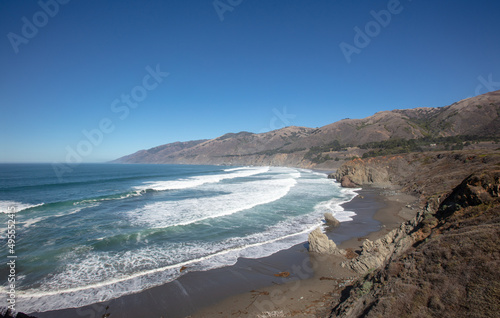 Waves breaking into the bay at the Original Ragged Point at Big Sur on the Central Coast of California United States