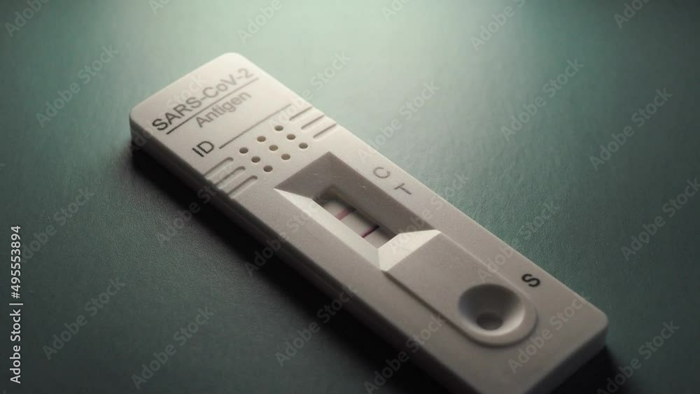 Rapid Antigen Test for self-diagnostic SARS-CoV-2, Covid-19, Coronavirus. Positive test result. Scene A. Rapid Antigen Test for self-diagnostic SARS-CoV-2, Covid-19, Coronavirus. Positive test result. Scene A.