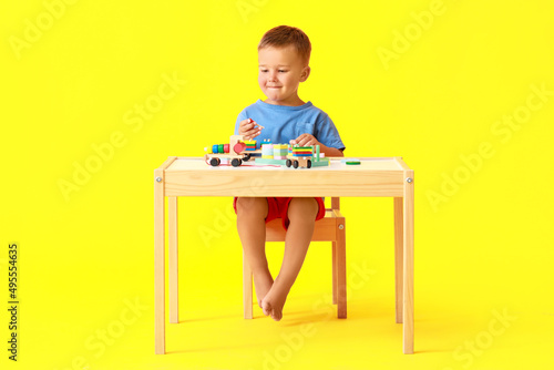 Cute little boy playing wit...