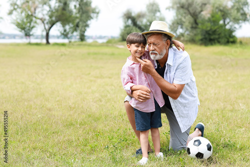 Senior man with his little ...