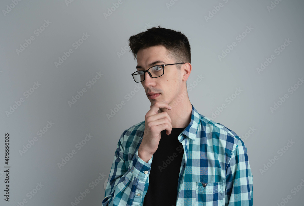 A male person in photo studio thinking 