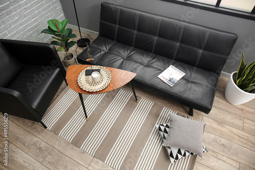 Comfortable sofa, table and...