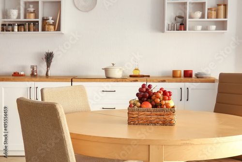 Fruit basket on wooden tabl...