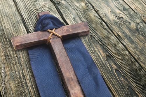 Wooden cross with of Crown of thorns. Christian religion.