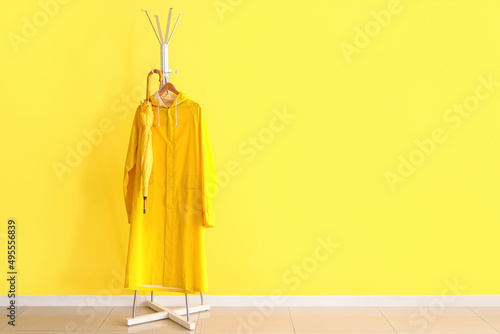 Rack with raincoat and umbr...