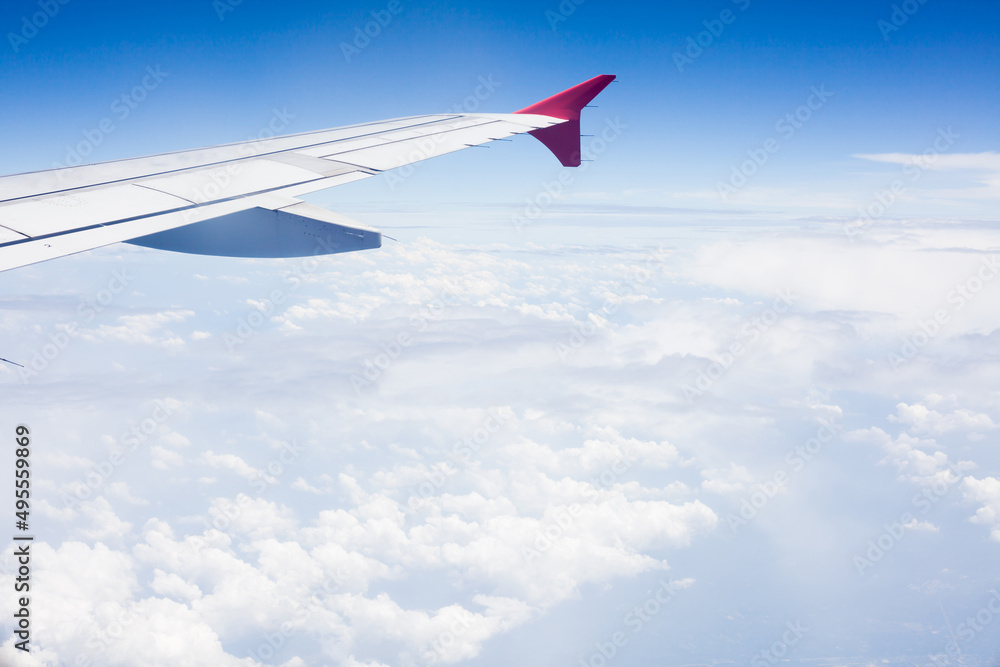 Cloudy view sky airplane, view from airplane window Cloudy view sky airplane, view from airplane window