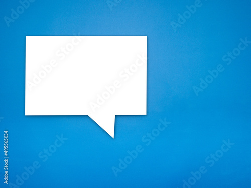 Blank white speech bubble part on a blue background