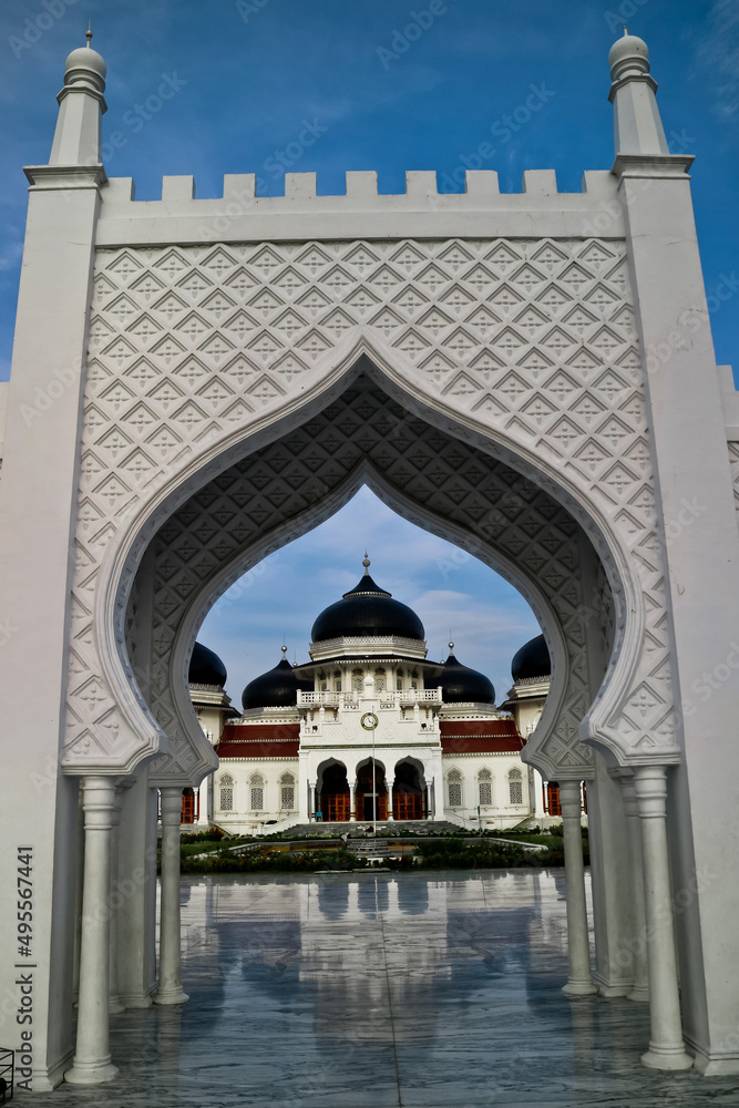 Naklejka premium Baiturrahman Mosque, Aceh, Indonesia. Baiturahman Mosque is a historic mosque and witnessed the awesomeness of the 2014 Aceh tsunami 