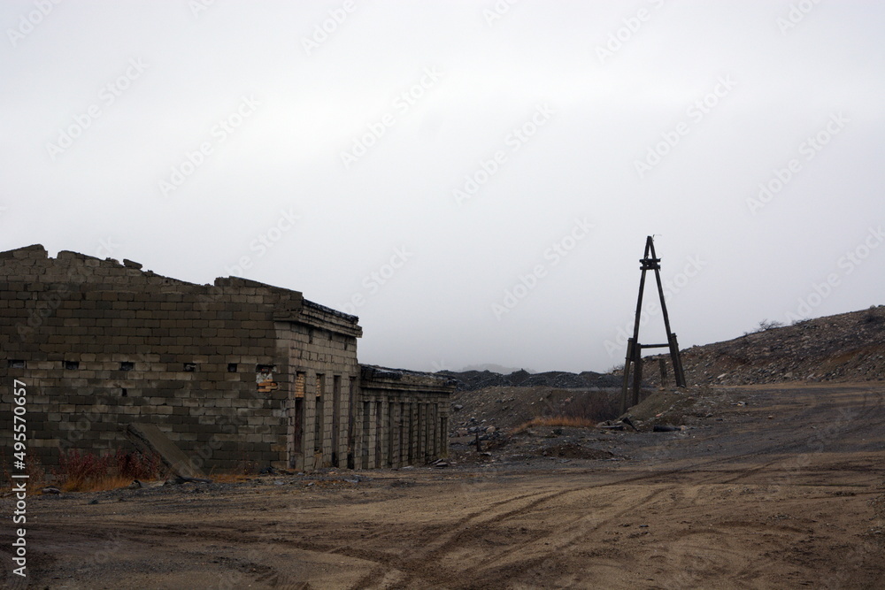 Destroyed houses and buildings. Nature pollution. Old abandoned huge
