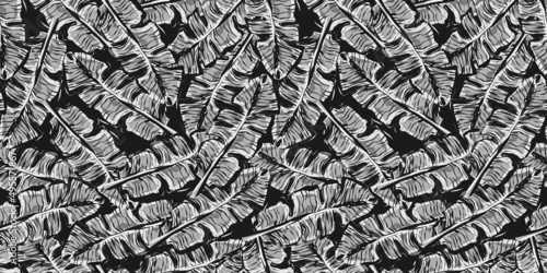Abstract tropical leaf seamless pattern. Camouflage background of exotic leaves.