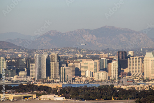 Looking over the skyline of Downtown San Diego, Naval Air Station North Island and the Peninsular Ranges in the distance from Point Loma