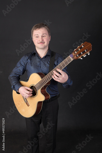 man playing a guitar