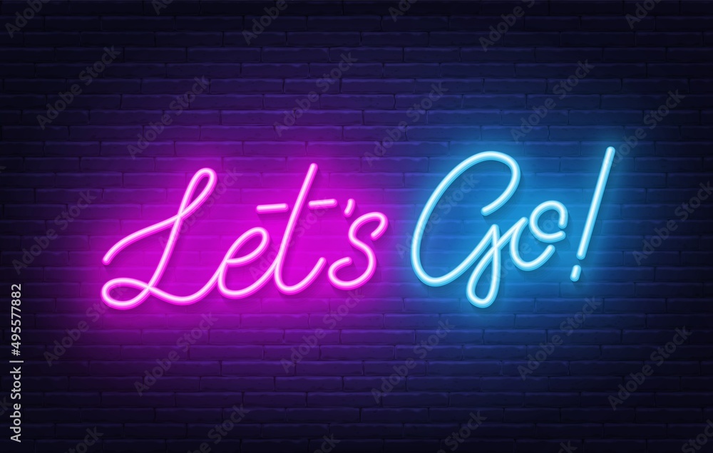 Let's go neon quote on a brick wall.