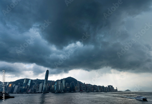 Canvas Print Hong Kong downtown with dark clouds in storm