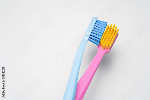 A conceptual of a couple toothbrush in love. Toothbrushes convey the human relationship between a man and a woman.