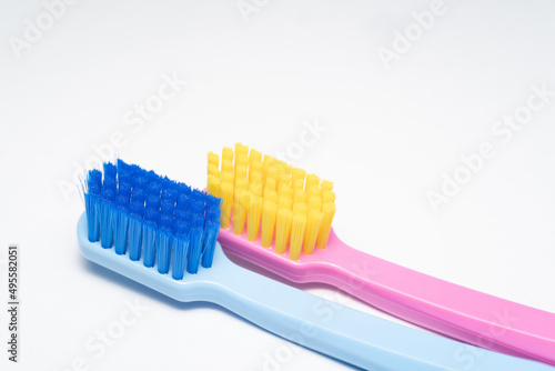 A conceptual of a couple toothbrush in love. Toothbrushes convey the human relationship between a man and a woman.