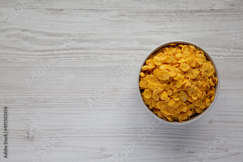 Tasty Corn Flakes in a Bowl, top view. Flat lay, overhead, from above. Copy space.