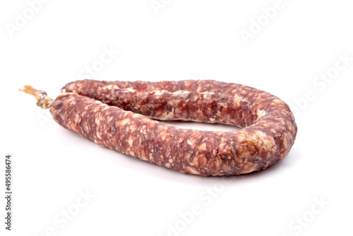 Dry cured pork sausage ring isolated on white