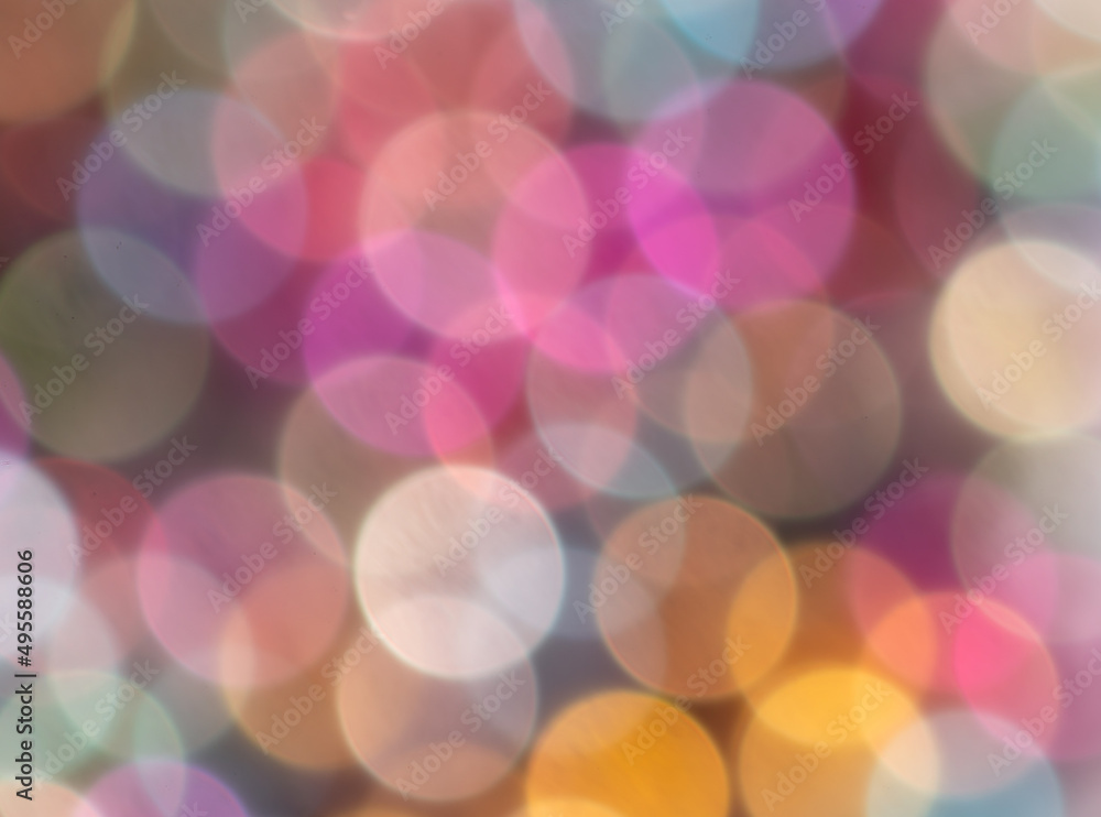 Multicolored festive bokeh as background. Multicolored festive bokeh as background.