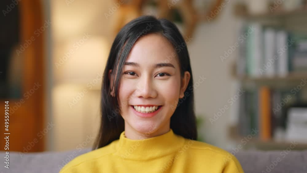 Portrait of young Asian woman smile and look at camera Portrait of young Asian woman smile and look at camera