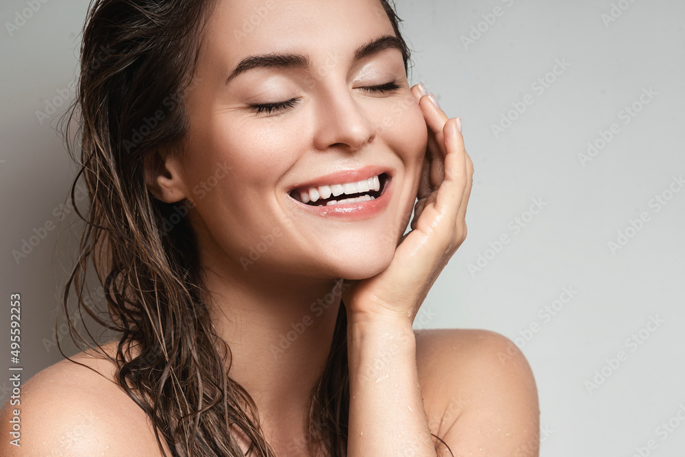 Young and beautiful woman with wet body and hair Young and beautiful woman with wet body and hair